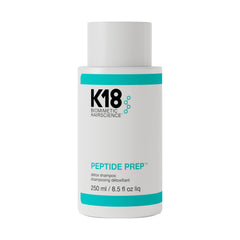 K18 envase frontal del champú prep detox mostrando volumen y fórmula segura para color