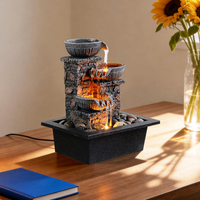 Kalona fuente colocada en mesa para comparar tamaño y escala
