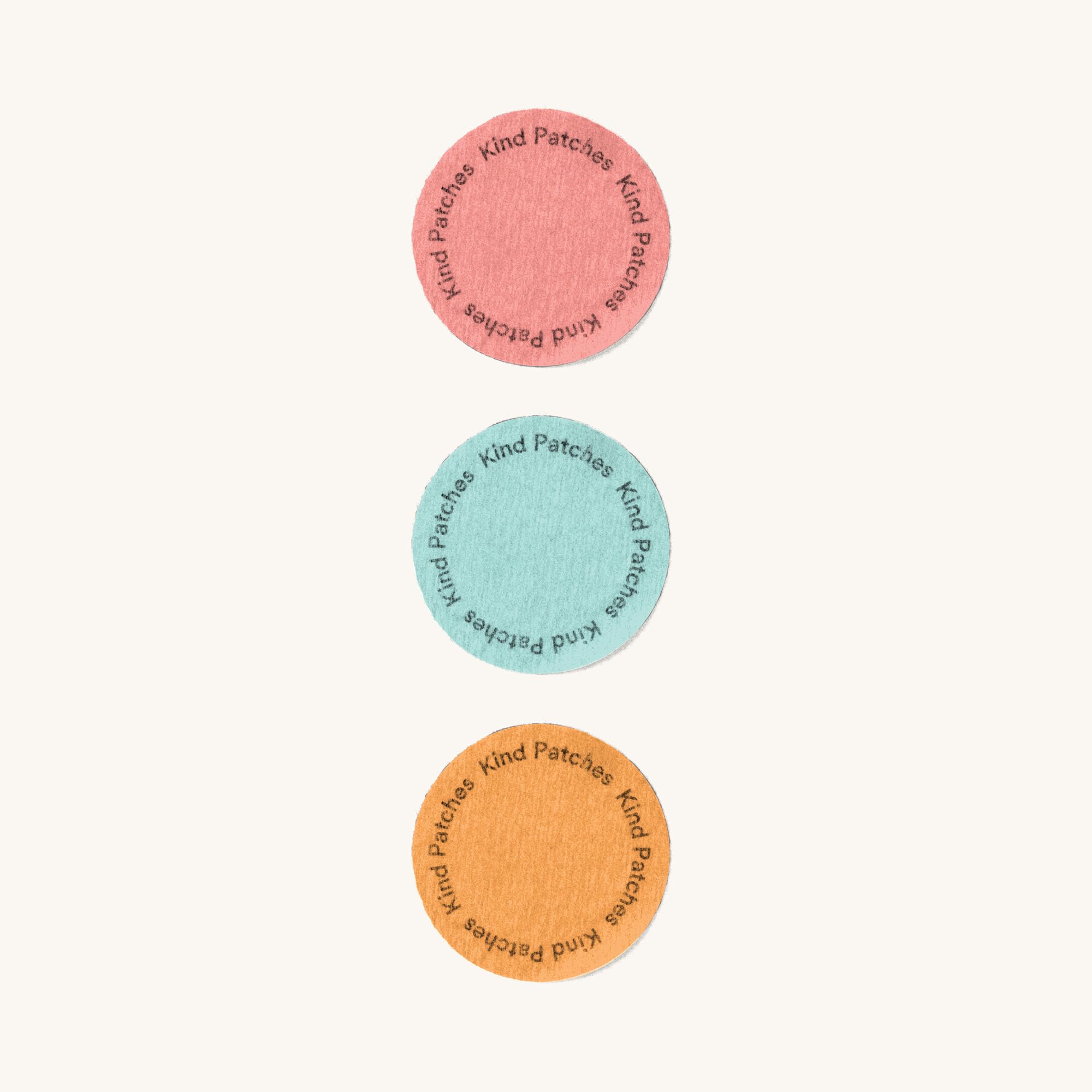 Kind Patches trio on a bathroom vanity with towel, suggests easy integration into routines
