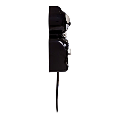 Kit Cat Klock mounted in kitchen setting, Kit Cat Klock classic look elevates room style
