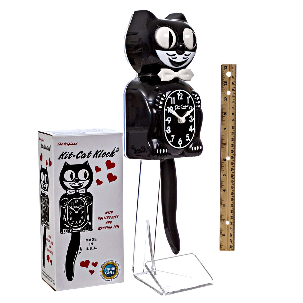 Kit Cat Klock beside ruler for scale, Kit Cat Klock 15.5-inch size shows true proportions