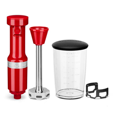 KitchenAid immersion blender in use blending soup in pot for smooth texture and less splatter