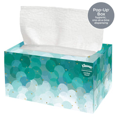 Kleenex caja colocada en dispensador de mostrador para uso comercial eficiente