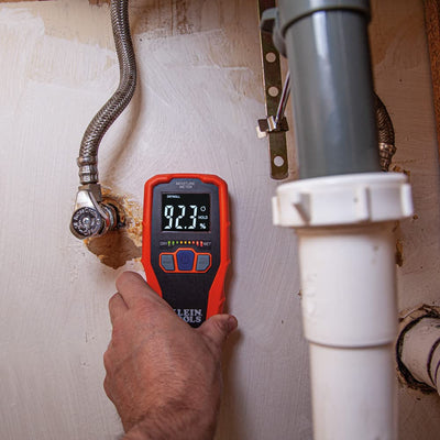 Klein Tools ET140 scanning hardwood floor to detect subsurface dampness quickly
