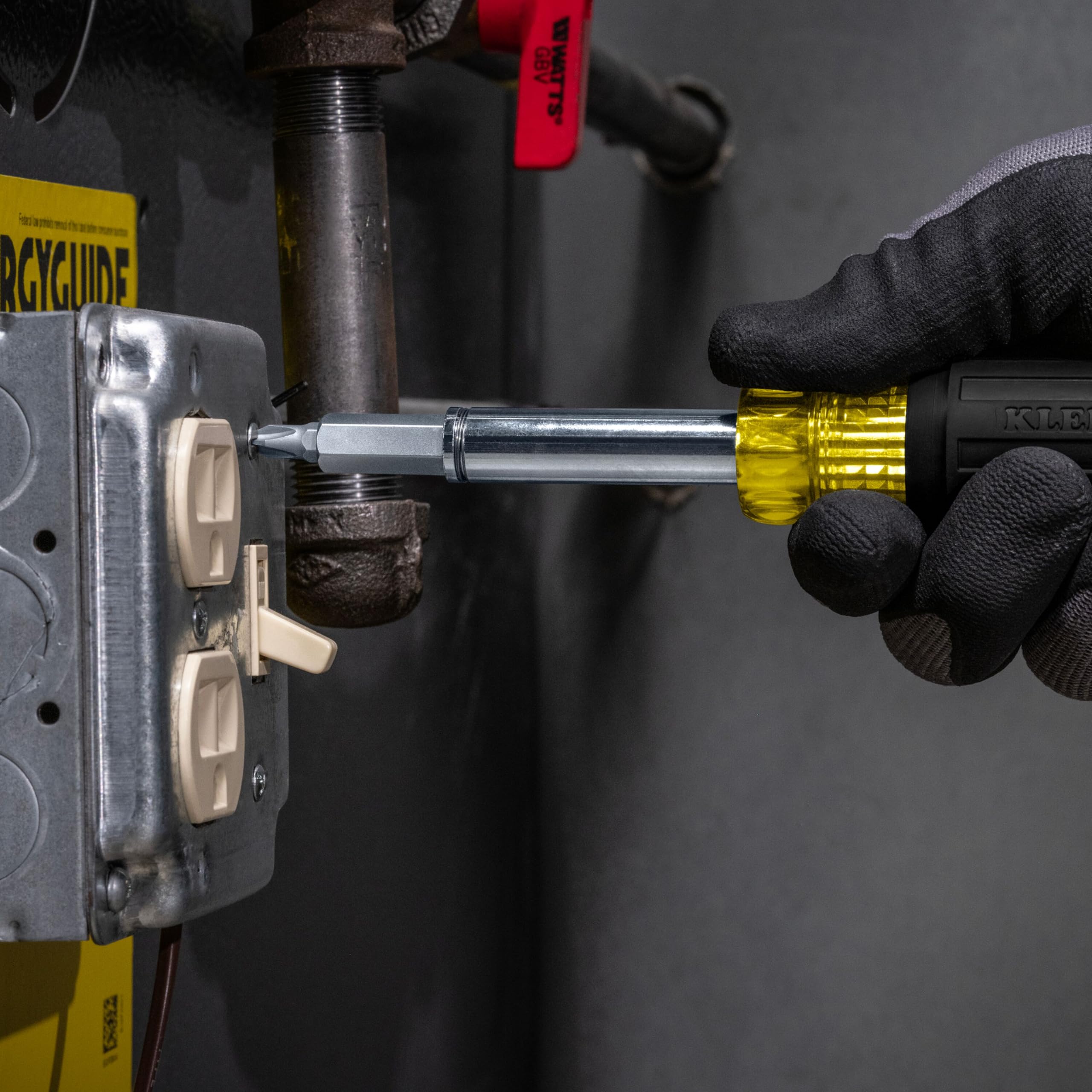 Klein Tools in-use by electrician driving a screw with one-handed magnetic retention
