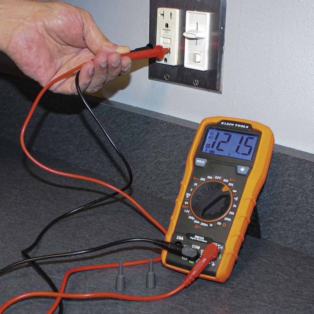 Klein Tools MM325 held in hand to show compact scale and portability