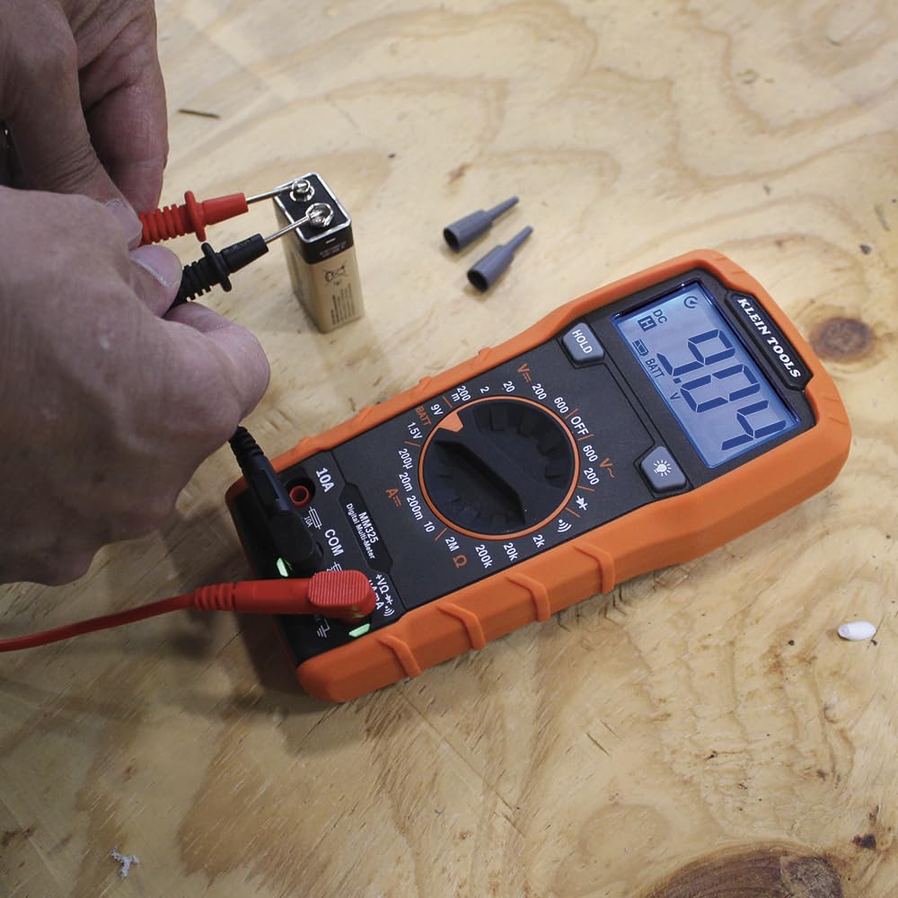 Klein Tools MM325 measuring outlet voltage for quick on-site diagnostics