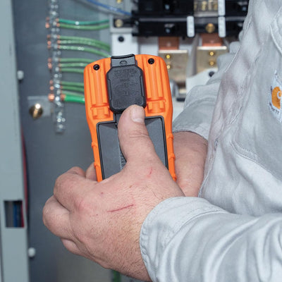 Klein Tools MM325 packaging with instructions and AAA batteries included