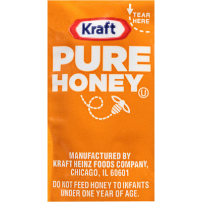 Kraft honey packets on a café table with tea, brand improving customer experience
