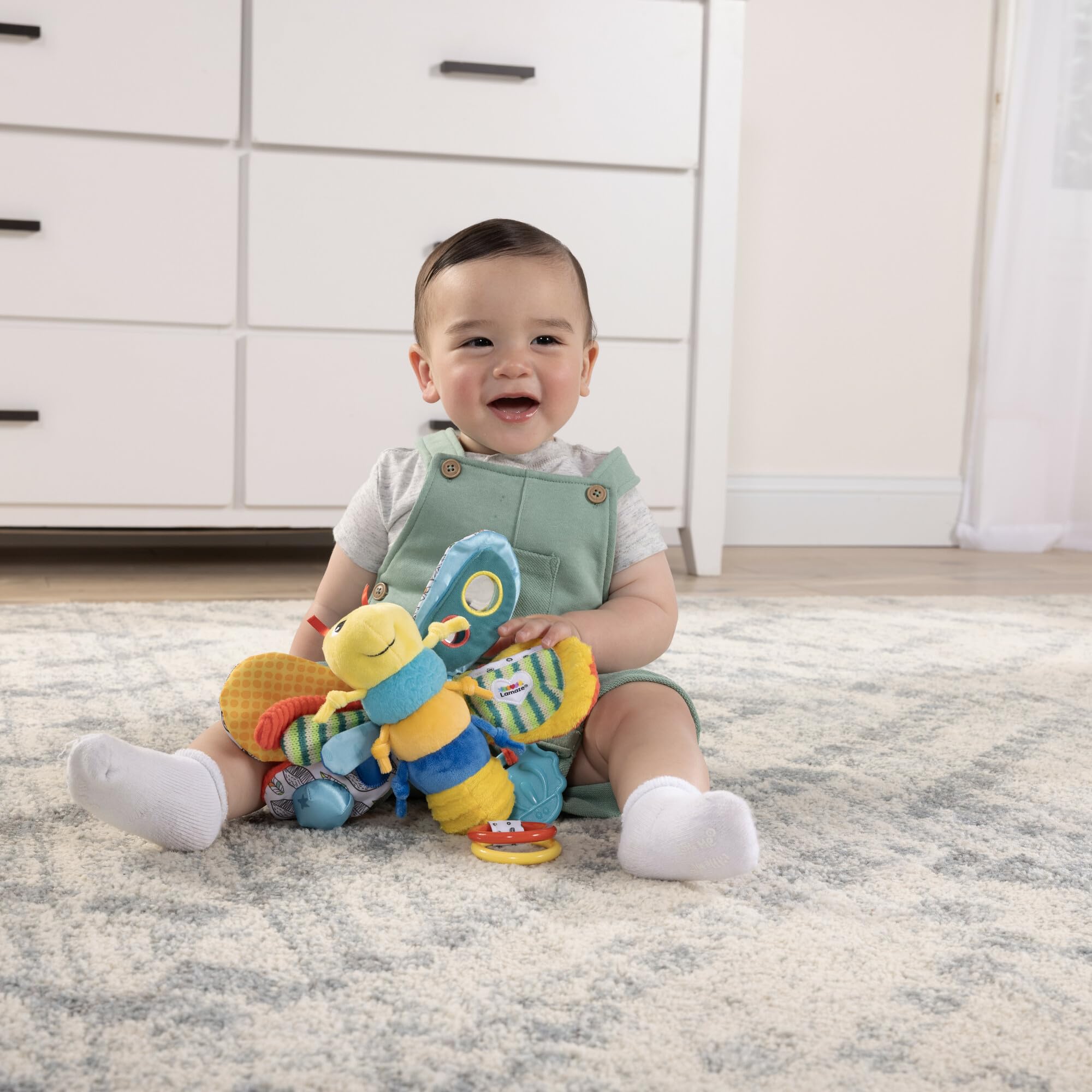 Lamaze Freddie primer plano de texturas y cintas para estimular el tacto