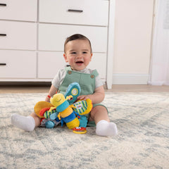 Lamaze Freddie primer plano de texturas y cintas para estimular el tacto