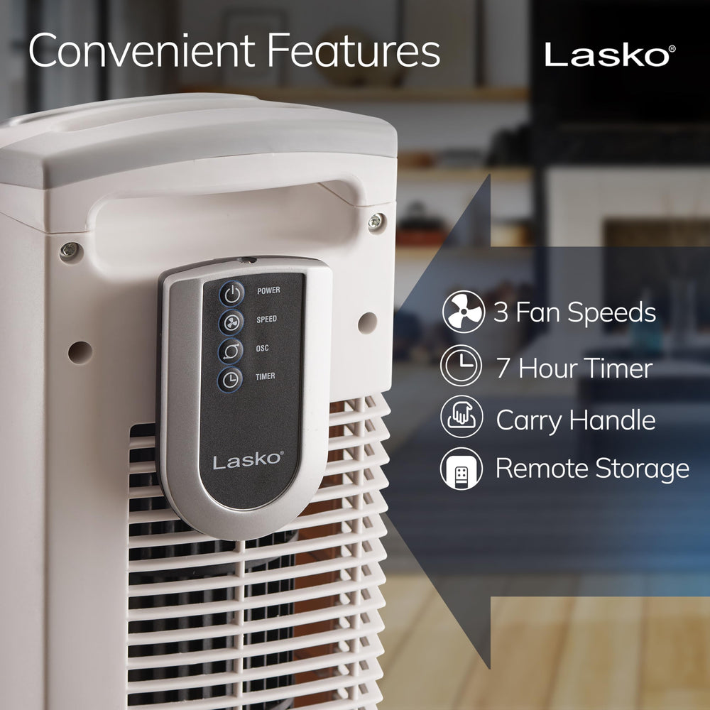 Lasko fan oscillating in a living room to circulate air across the space