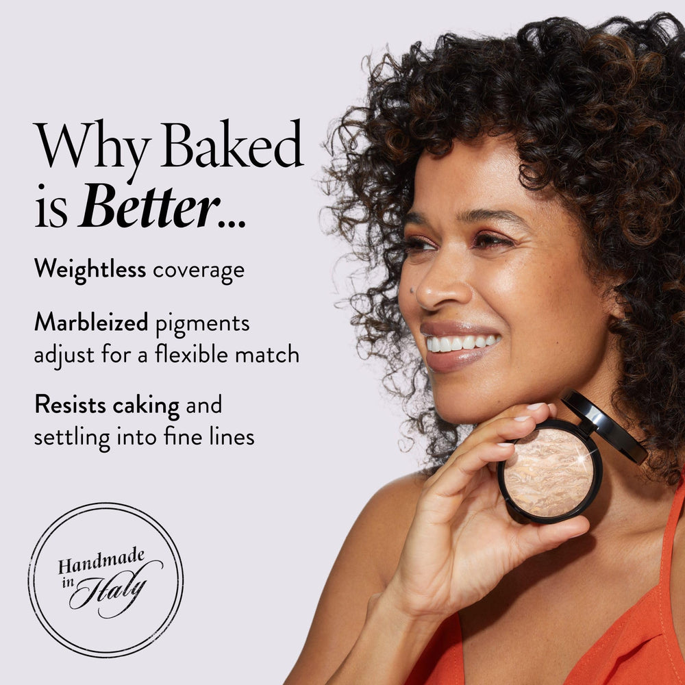 LAURA GELLER brush applying powder to cheek for natural satin glow