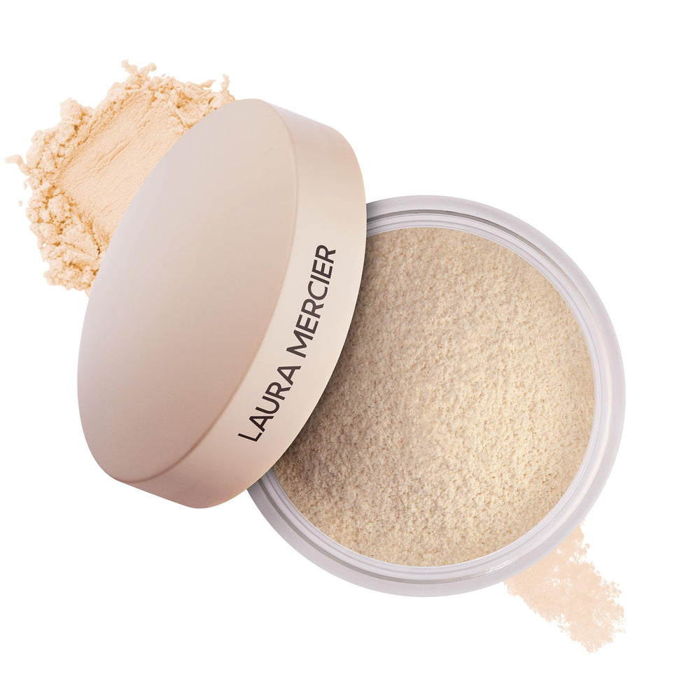 Laura Mercier jar front view showing sleek packaging and translucent powder benefit