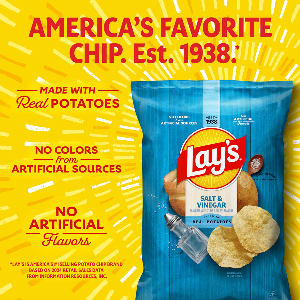Lay's single 1 oz bag held in hand demonstrating portable size and on-the-go convenience