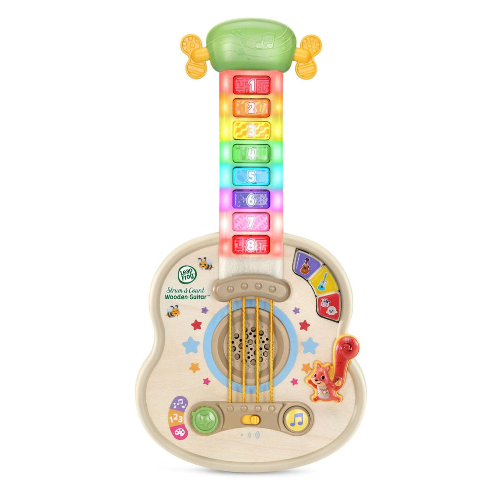 LeapFrog familia jugando con la guitarra en una sala infantil alegre