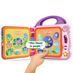 LeapFrog libro en manos de bebé fomentando interacción y aprendizaje táctil