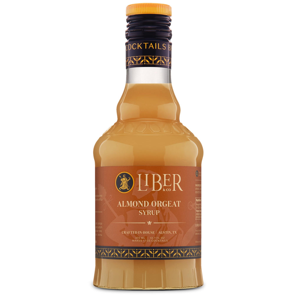 Liber & Co. botella frontal mostrando etiqueta y formato, perfecta para barras
