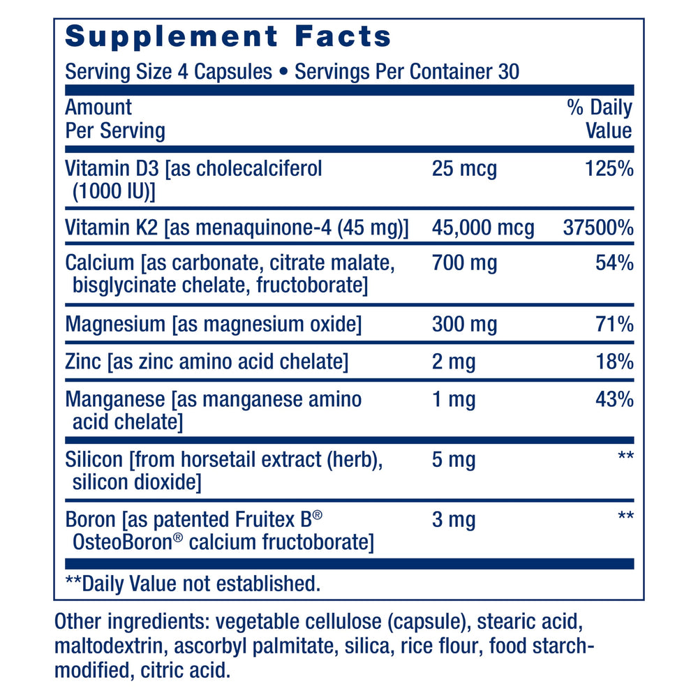 Hand holding Life Extension capsules showing easy-to-swallow size and convenience