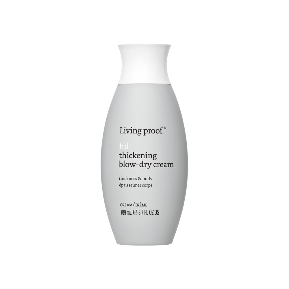Living Proof envase frontal del producto mostrando marca y tamaño 4 oz, ideal para volumen