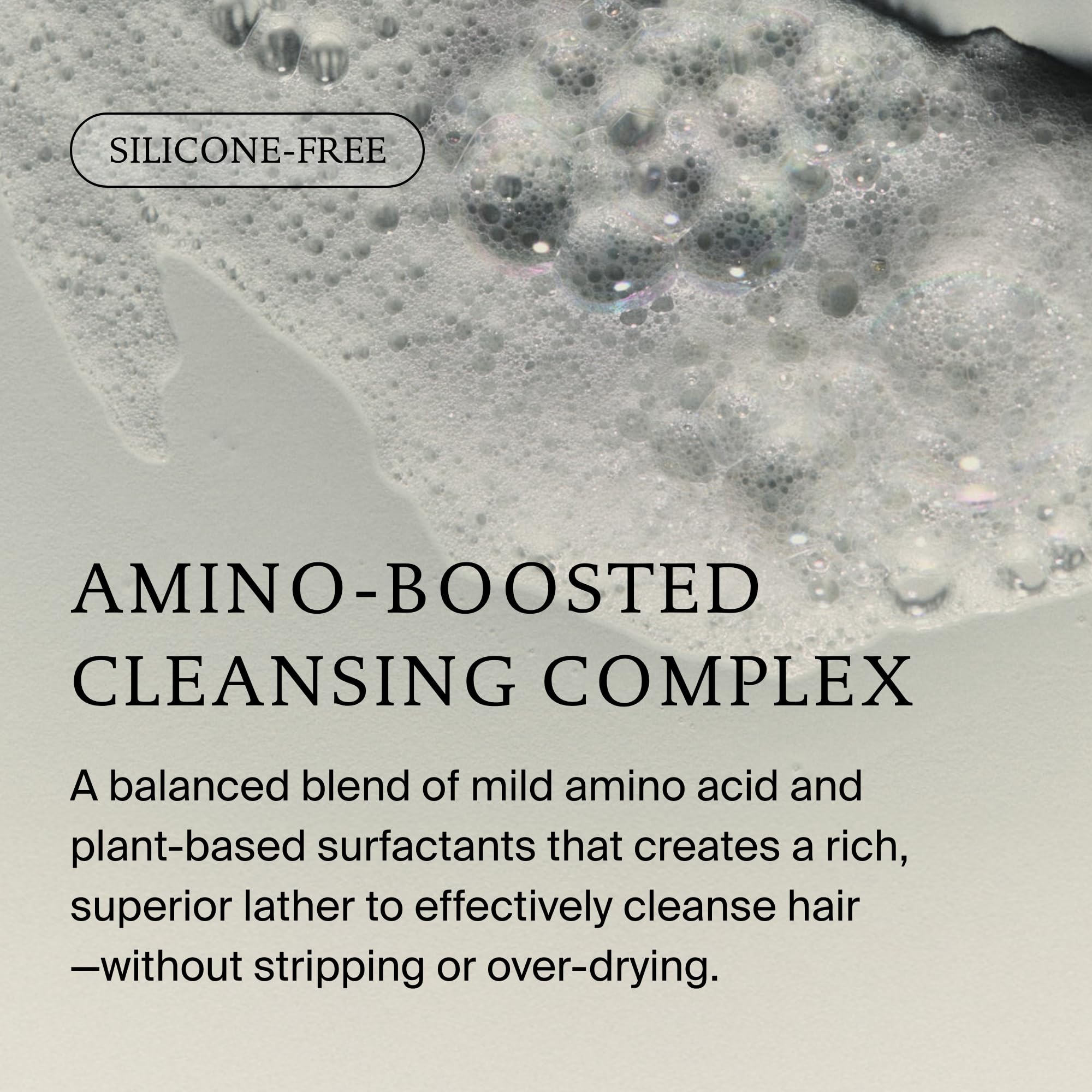 Living Proof botella abierta con gotas que sugieren fácil dispensado