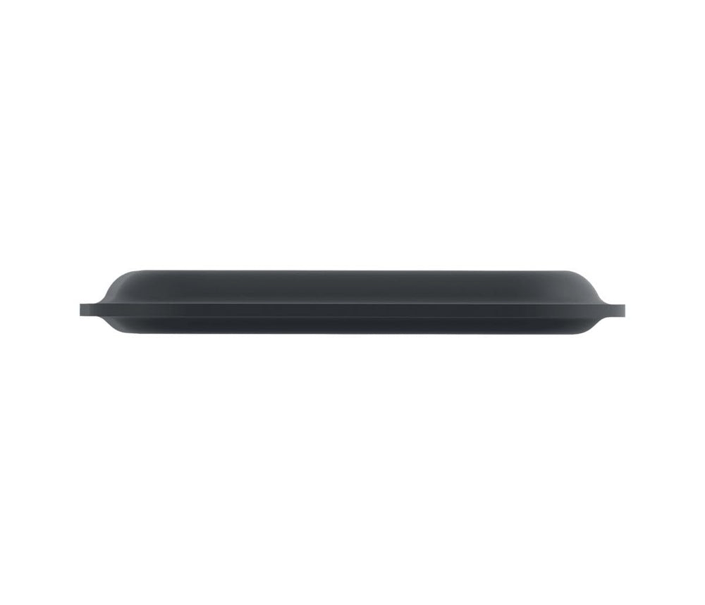 Logitech palm rest being wiped clean demonstrating stain-resistant finish