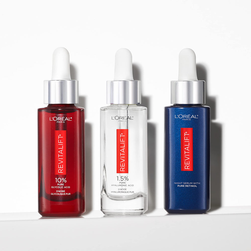 L'Oreal Paris ambiente nocturno con producto listo para la rutina de noche