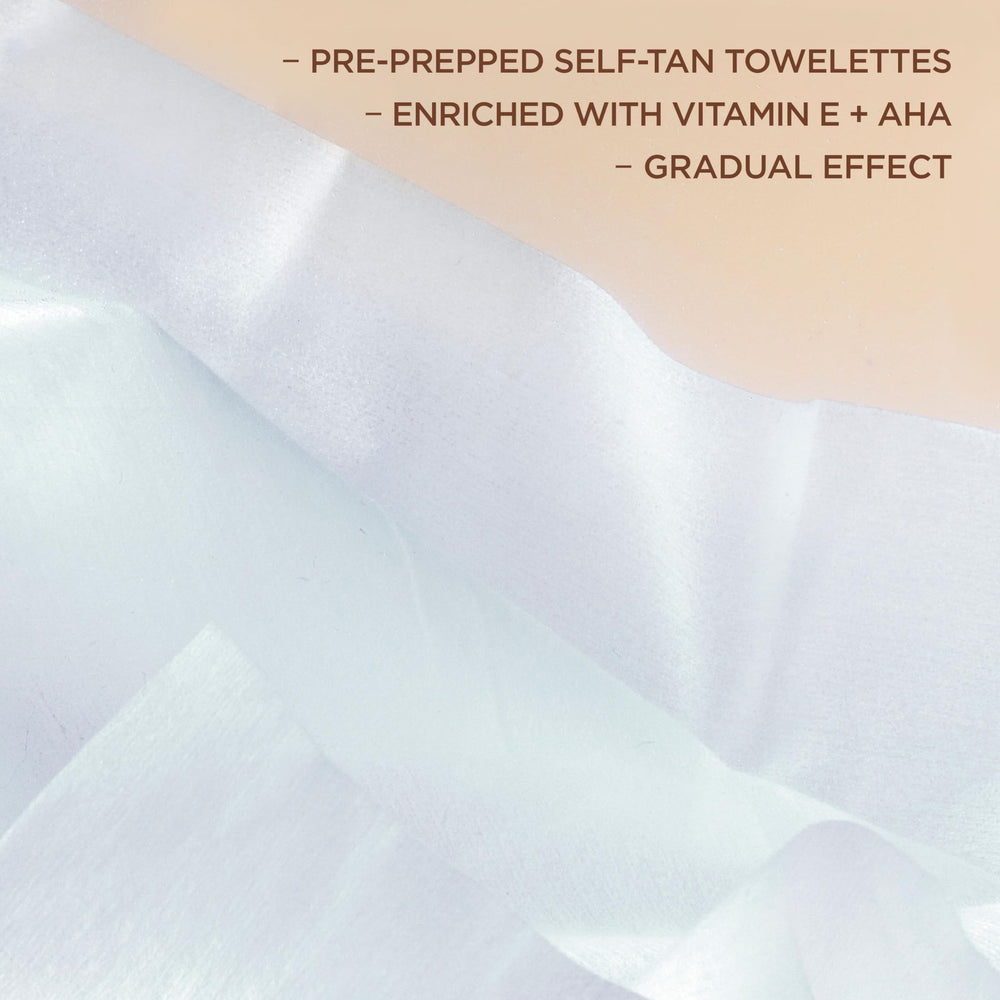 L'Oreal Paris applying towelette to forearm demonstrating smooth, streak-free finish