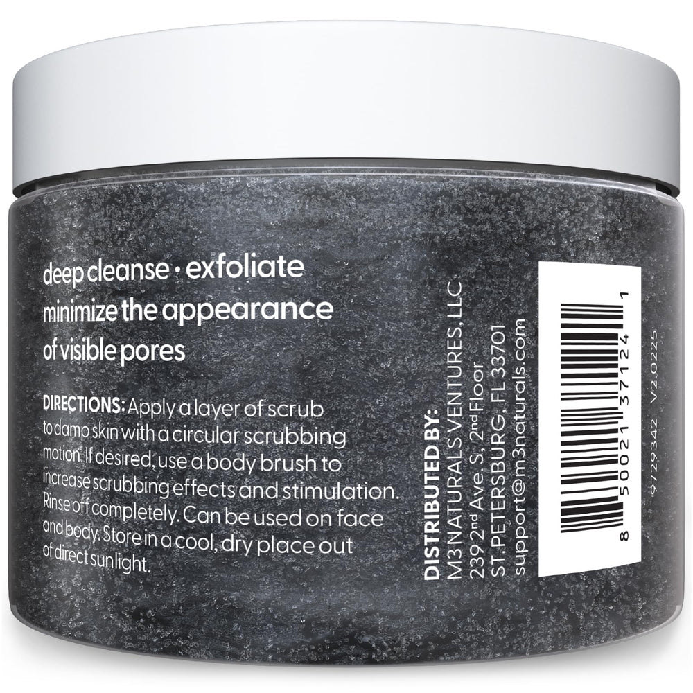 M3 Naturals charcoal scrub texture close-up showing exfoliating grains