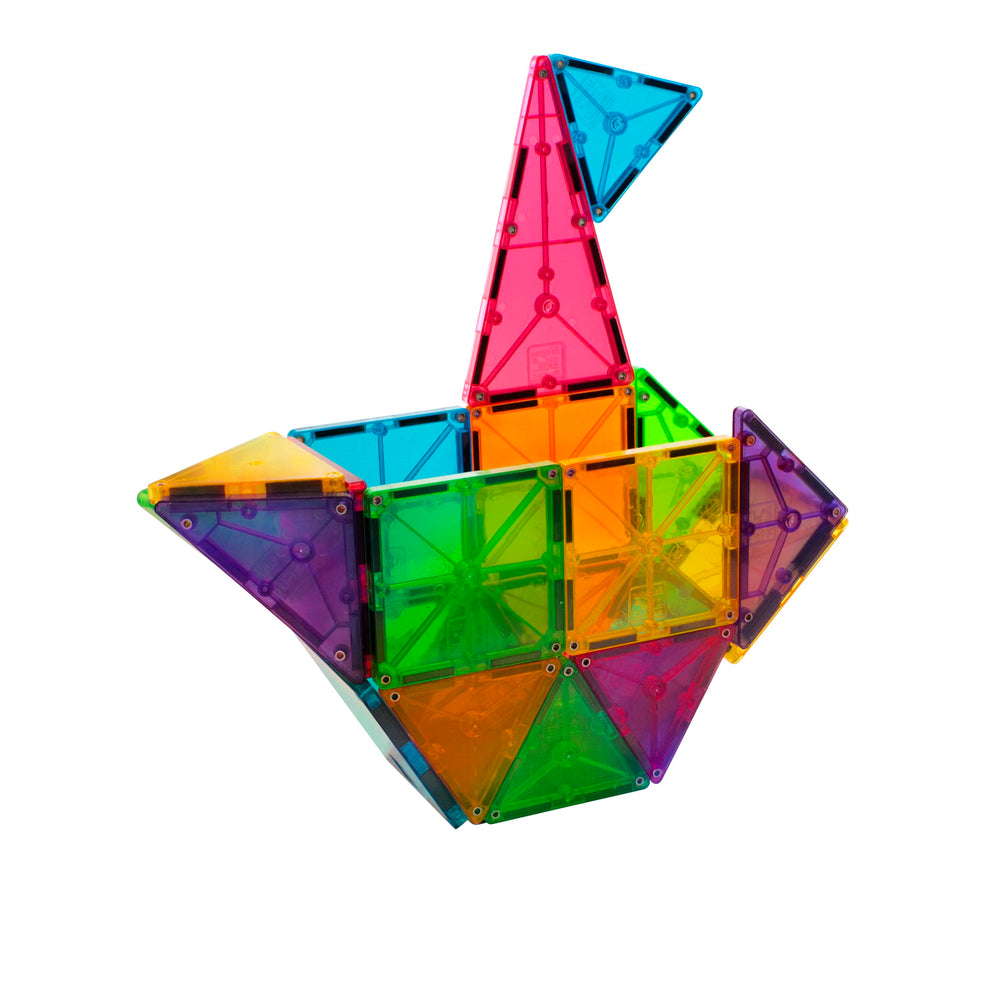 MAGNA-TILES niños y adultos jugando juntos fomentando creatividad compartida