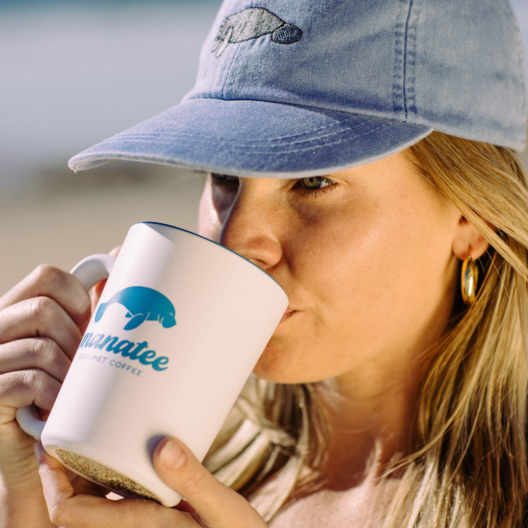 conservation badge and donation info with Manatee Gourmet branding benefit: emphasizes support for manatee and marine groups