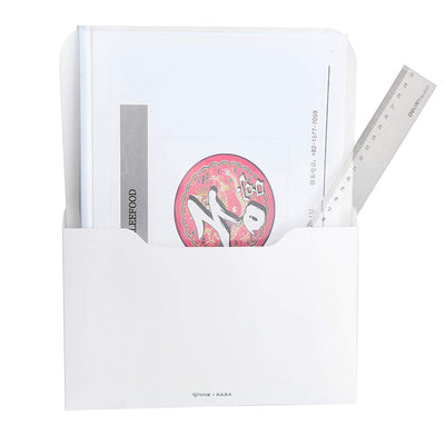 Marbrasse instalado en nevera sosteniendo facturas y notas accesibles
