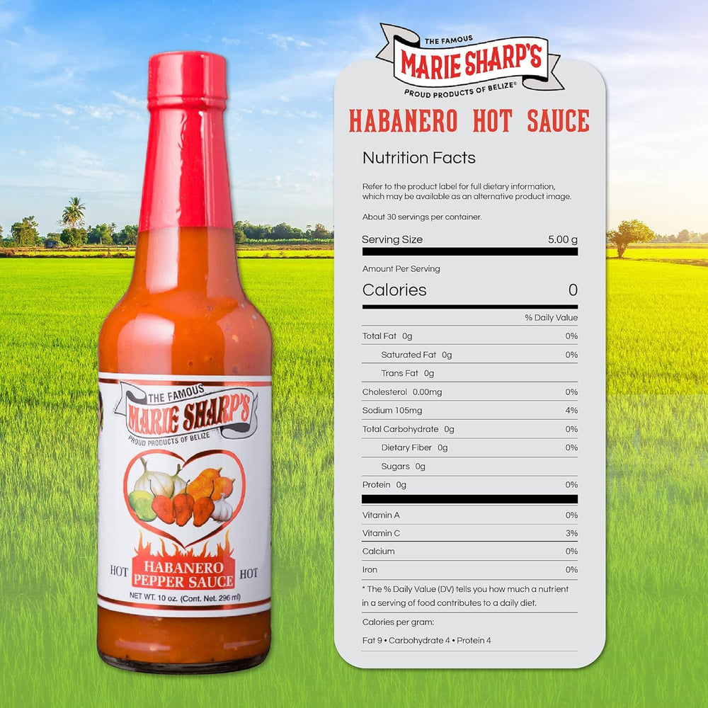 Marie Sharp's frasco junto a regla para comparar tamaño práctico de 10 oz