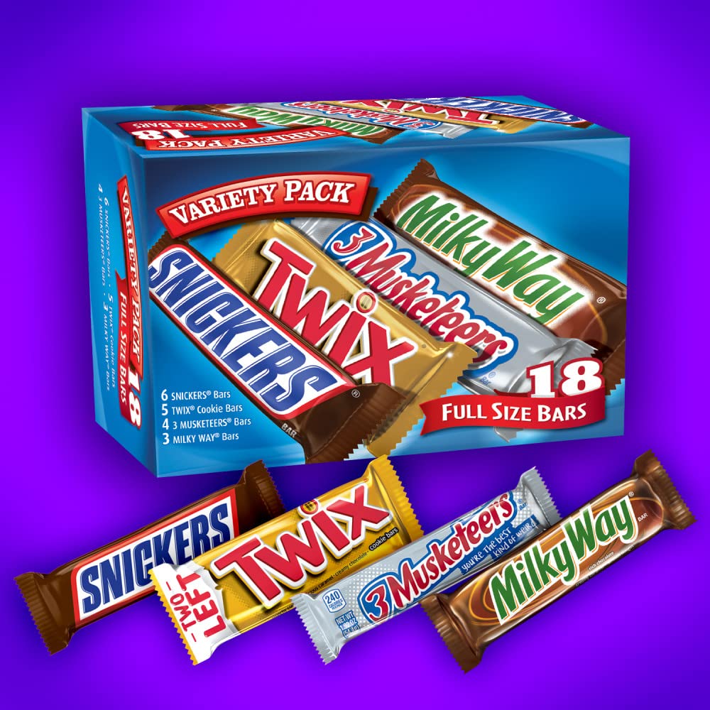 Mars barra SNICKERS cortada mostrando cacahuetes y caramelo