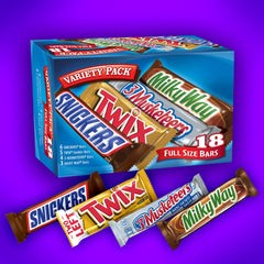Mars barra SNICKERS cortada mostrando cacahuetes y caramelo