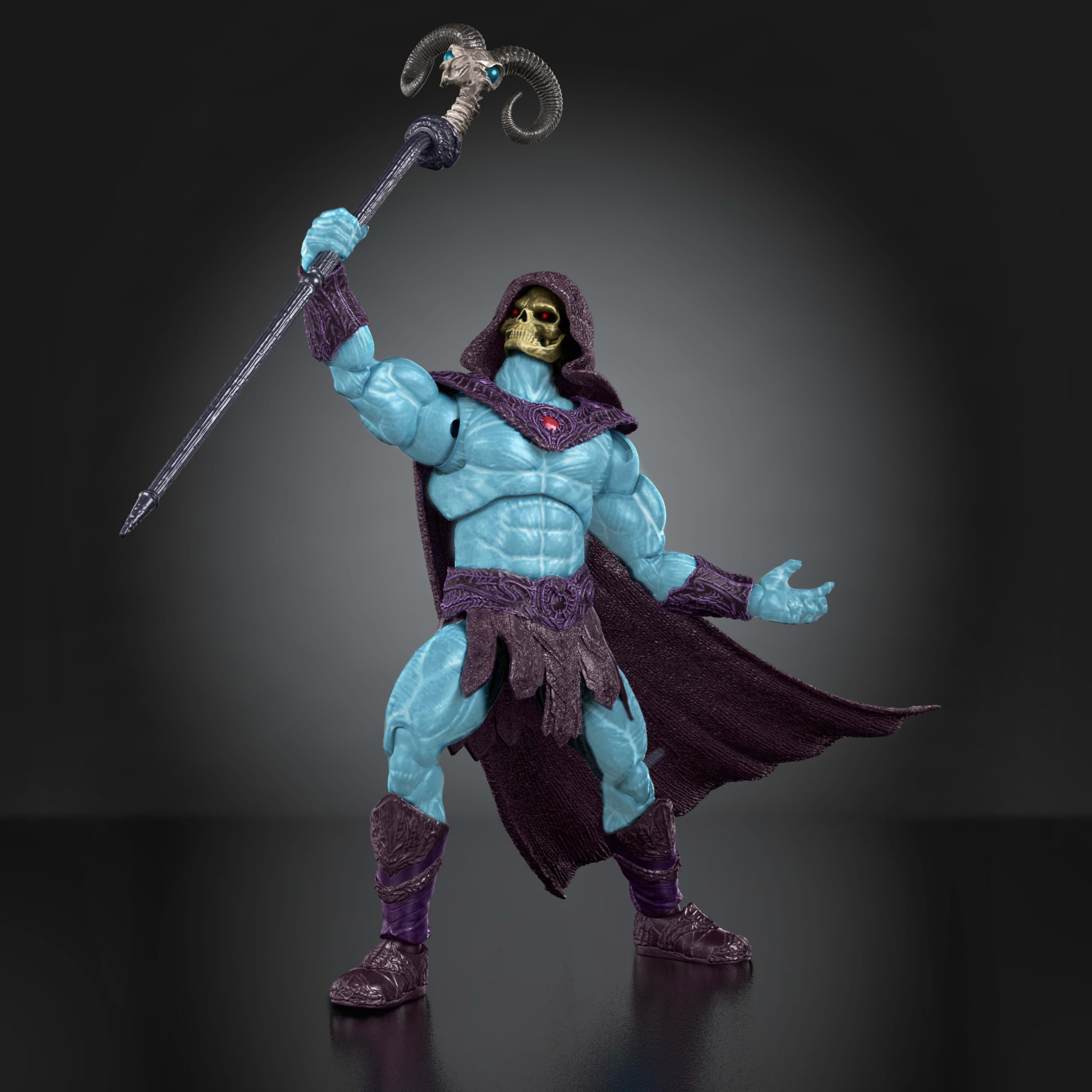 Masters of the Universe Skeletor holding Havoc Staff accessory demonstrating posing options