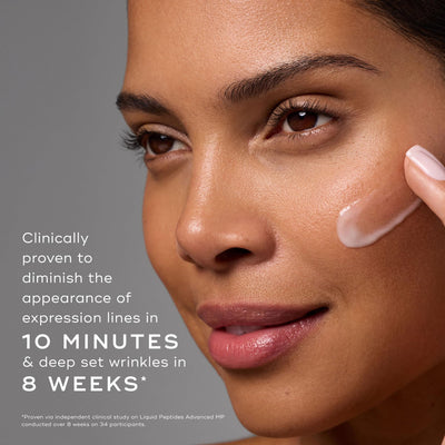 Medik8 bottle staged in night routine setting suggests evening repair and hydration benefit