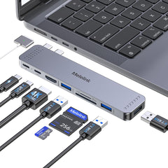 Melelink adaptador frontal junto al puerto del MacBook, ofrece más puertos prácticas
