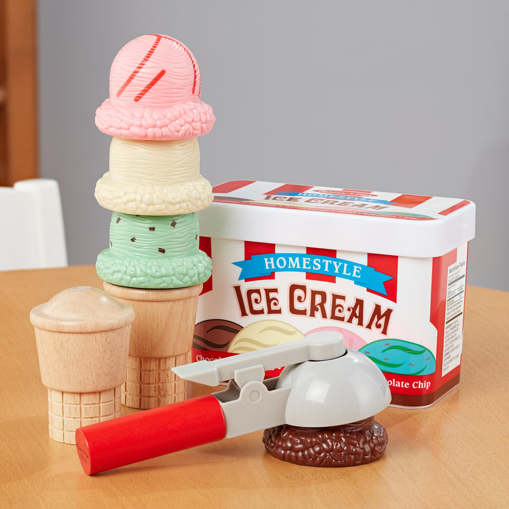 Melissa & Doug set junto a una cocina de juguete ampliando la experiencia de venta