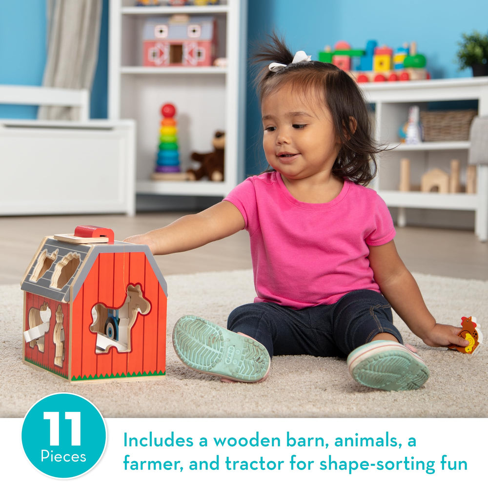 Melissa & Doug carrying handle held by child showing portable, on-the-go benefit