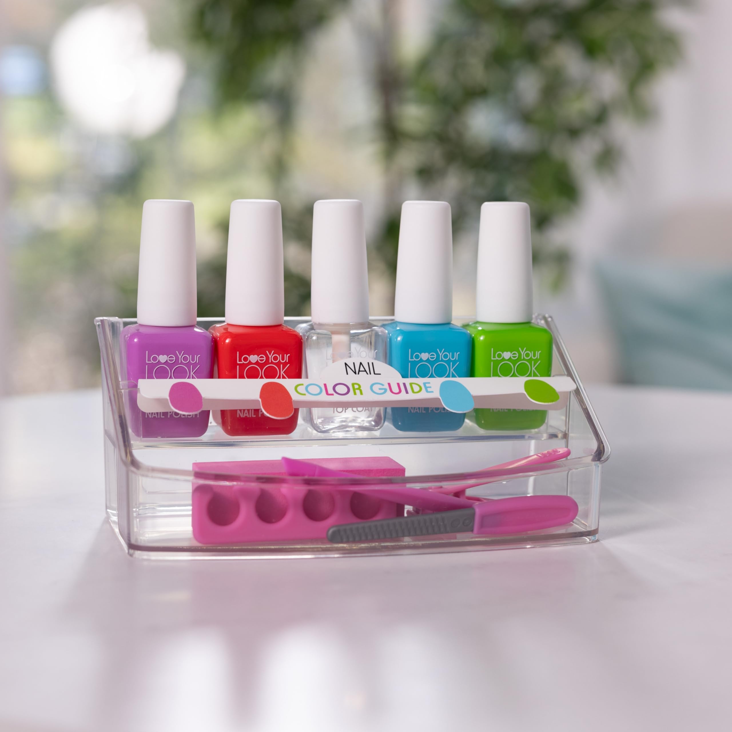 Melissa & Doug child giving a pretend manicure in a home salon scene