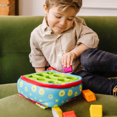 Melissa & Doug close-up of textured shape blocks highlighting tactile surfaces for sensory exploration