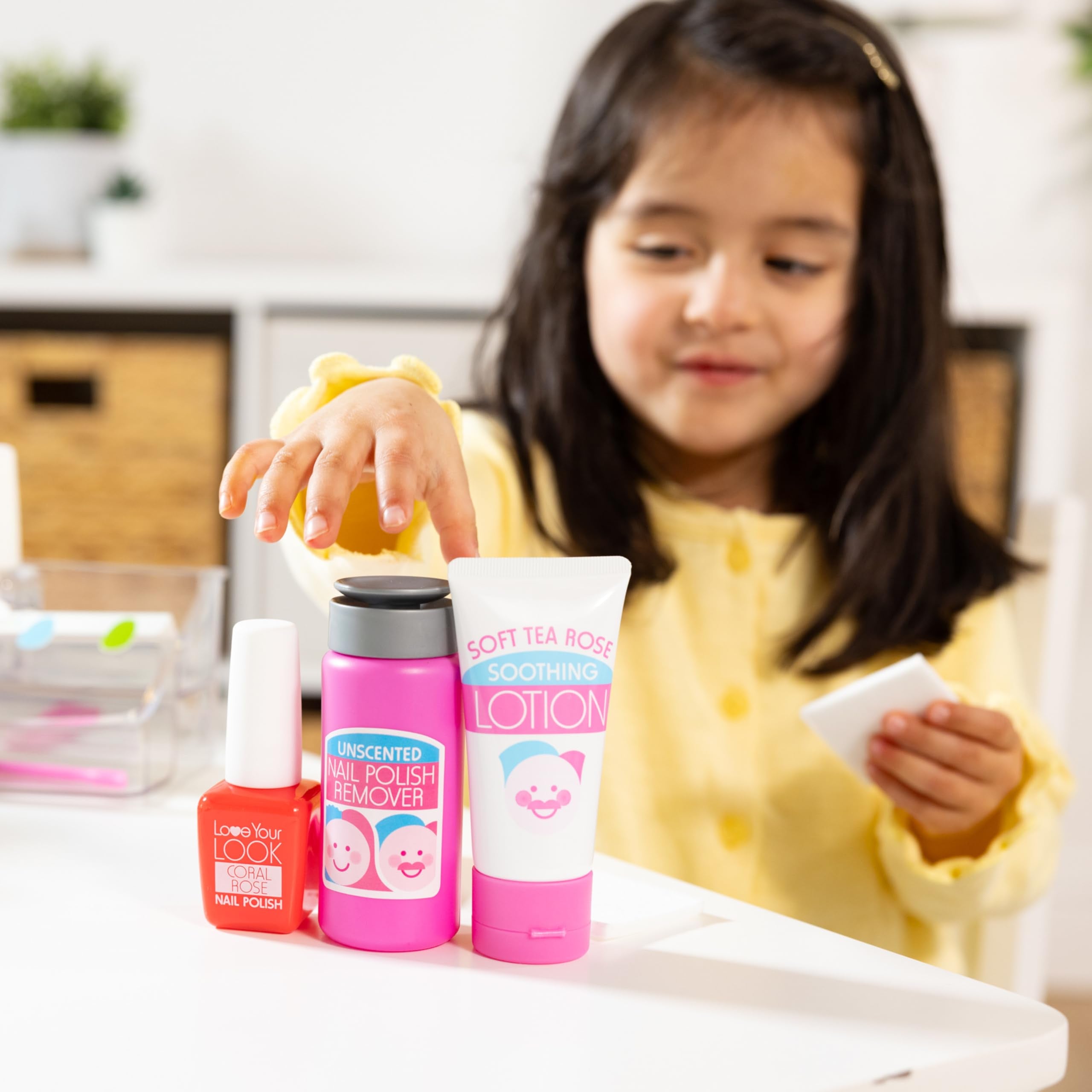 Melissa & Doug toe separator and pedicure setup encouraging cooperative play