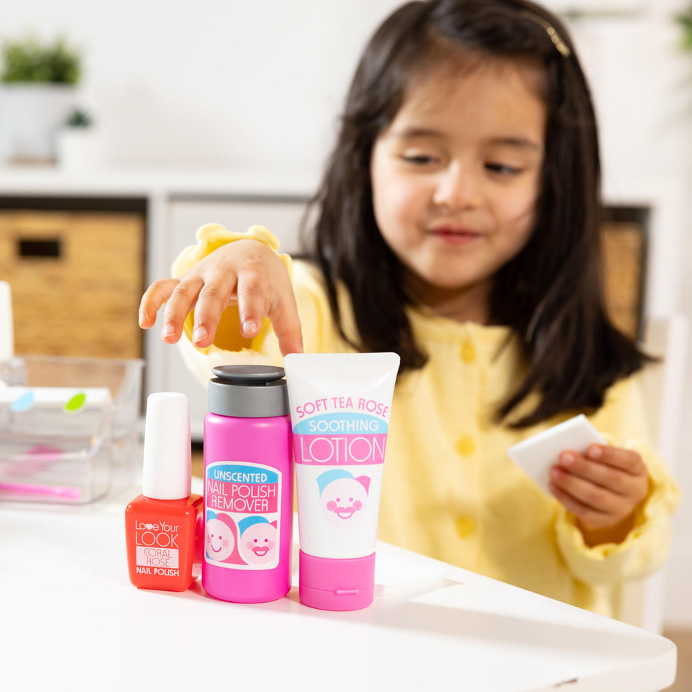 Melissa & Doug toe separator and pedicure setup encouraging cooperative play
