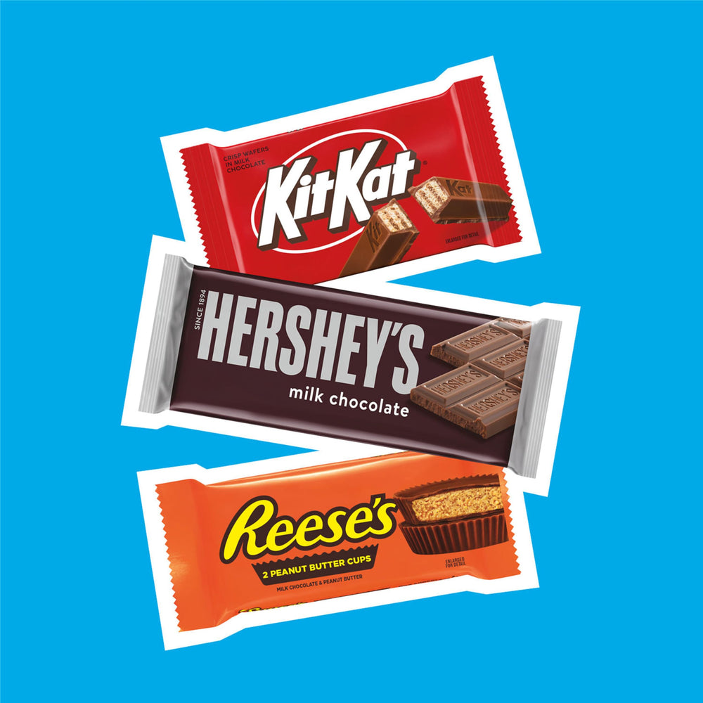 Mesa de fiesta con HERSHEY'S KIT KAT REESE'S ideal para eventos