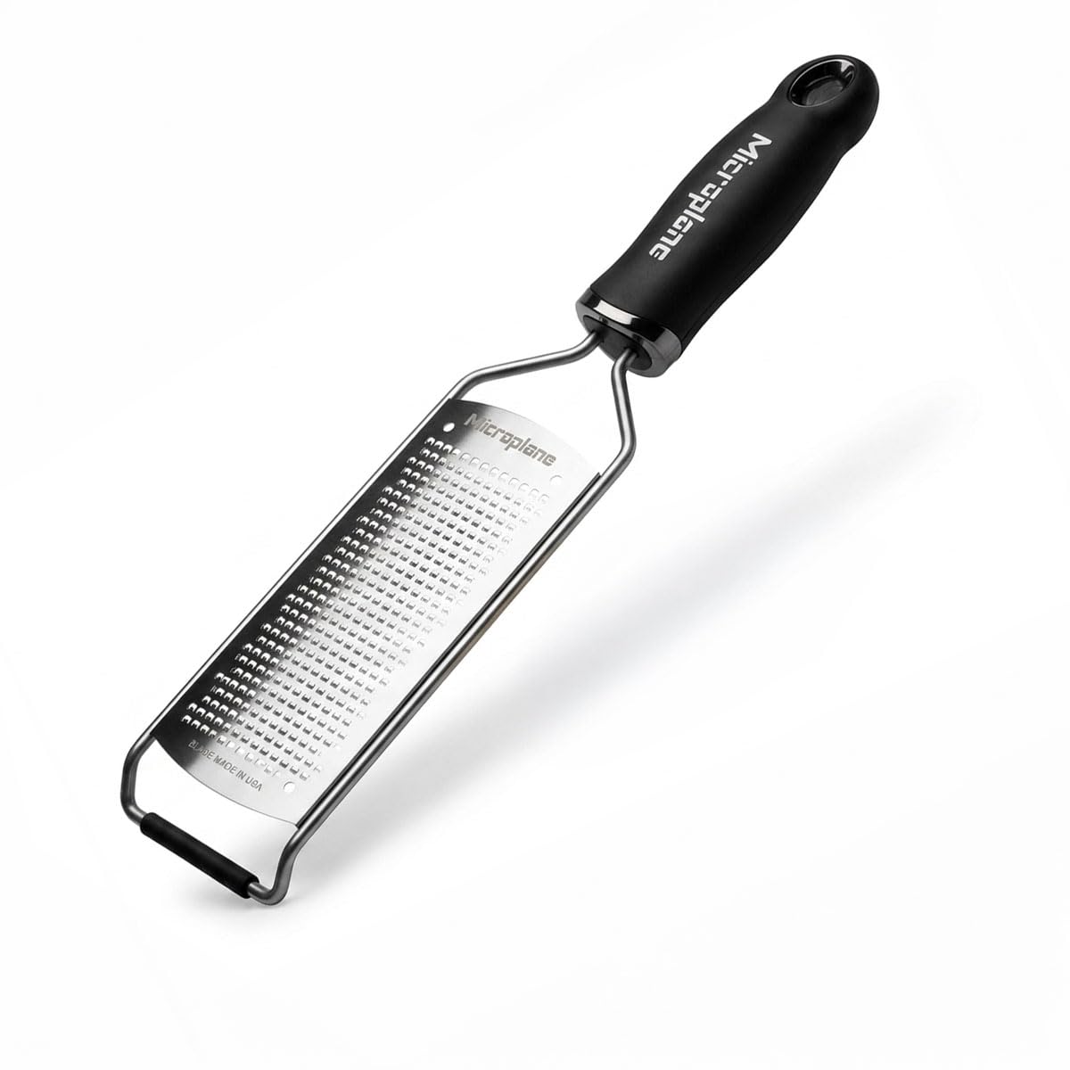 Microplane gourmet fine grater front view showing compact black handle and blade for precise results