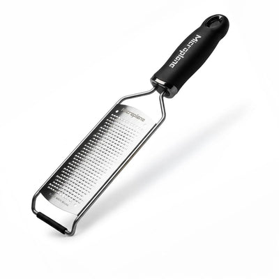 Microplane gourmet fine grater front view showing compact black handle and blade for precise results