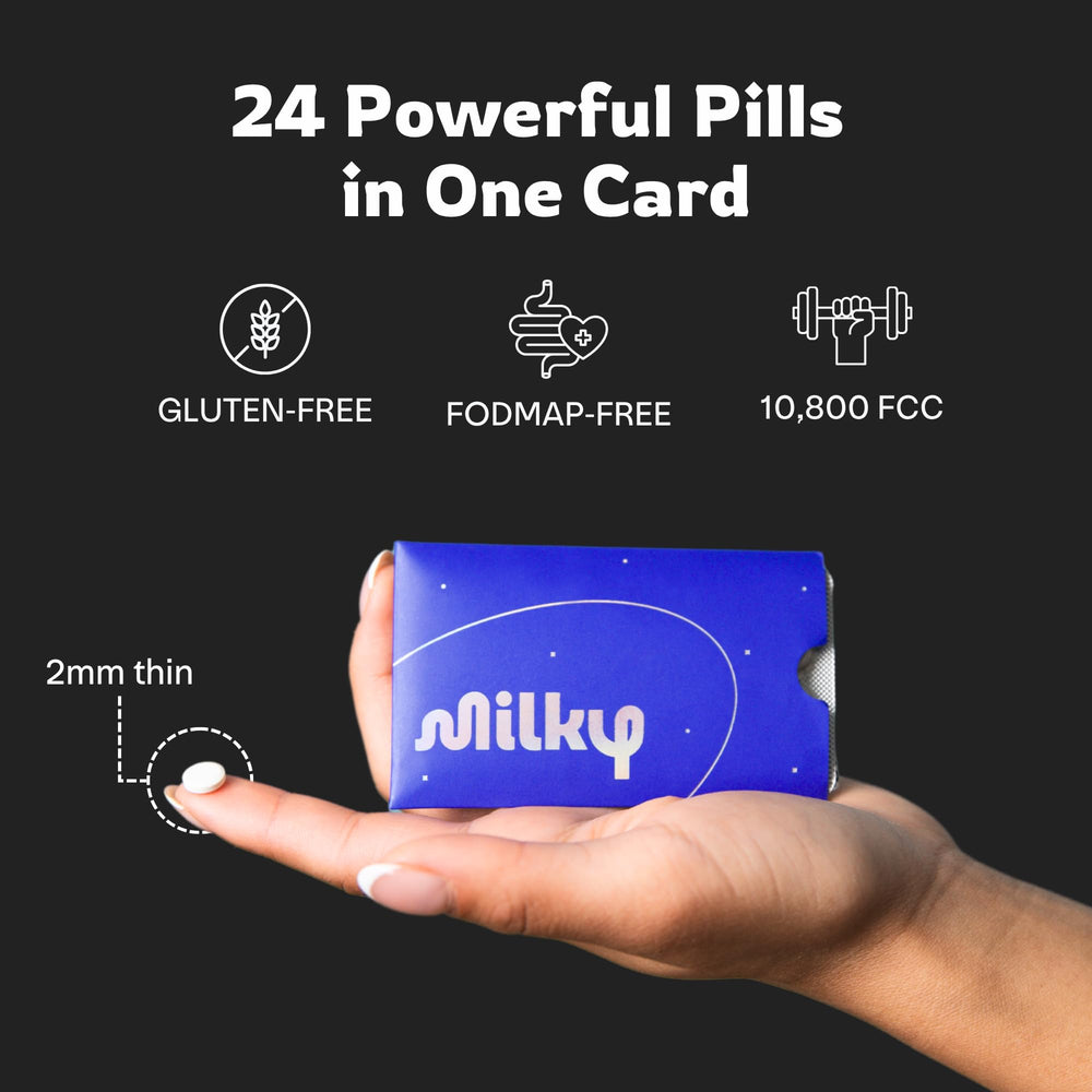 Milky tablet beside fork for scale demonstrating pocketable size