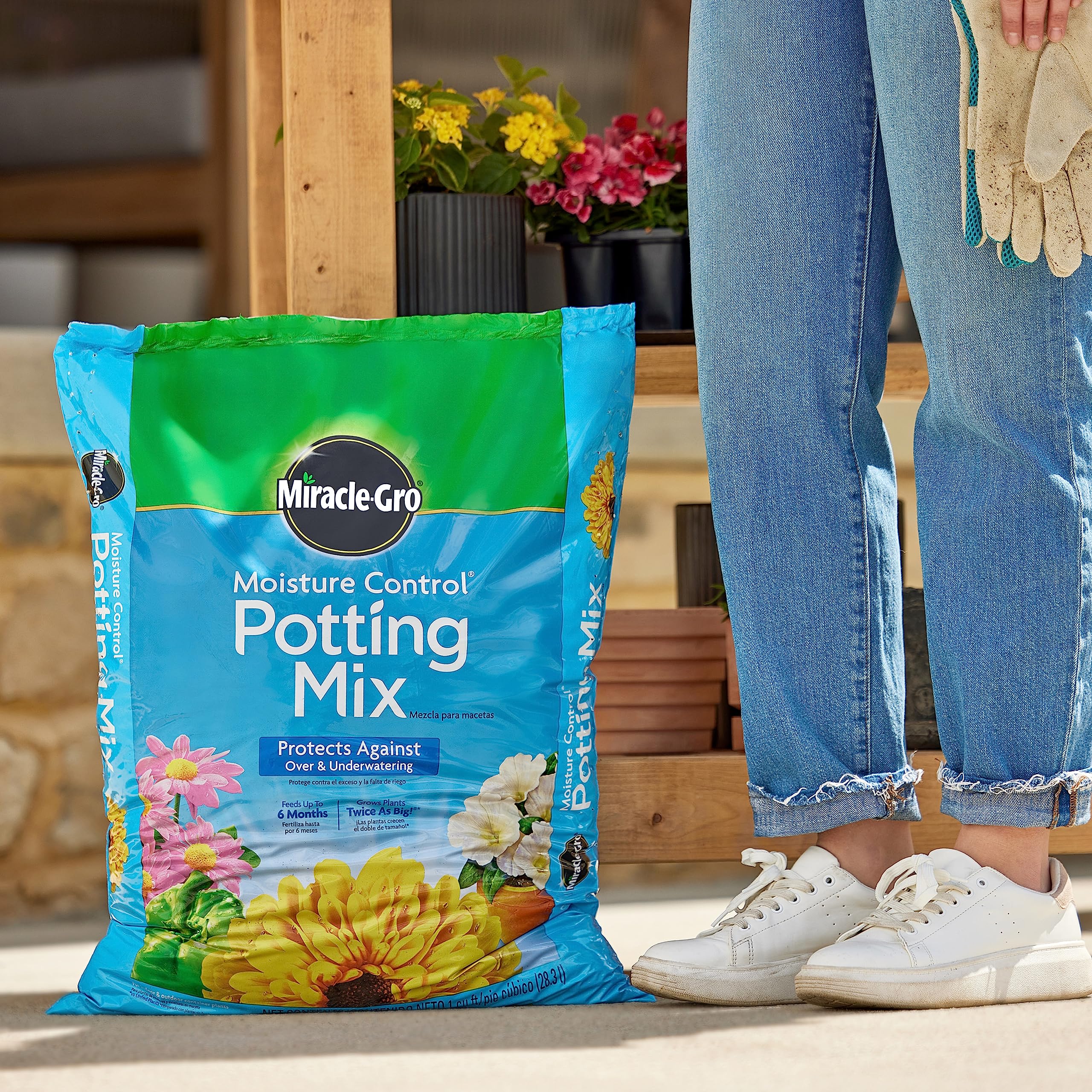 Miracle-Gro being poured into a pot for easy planting setup