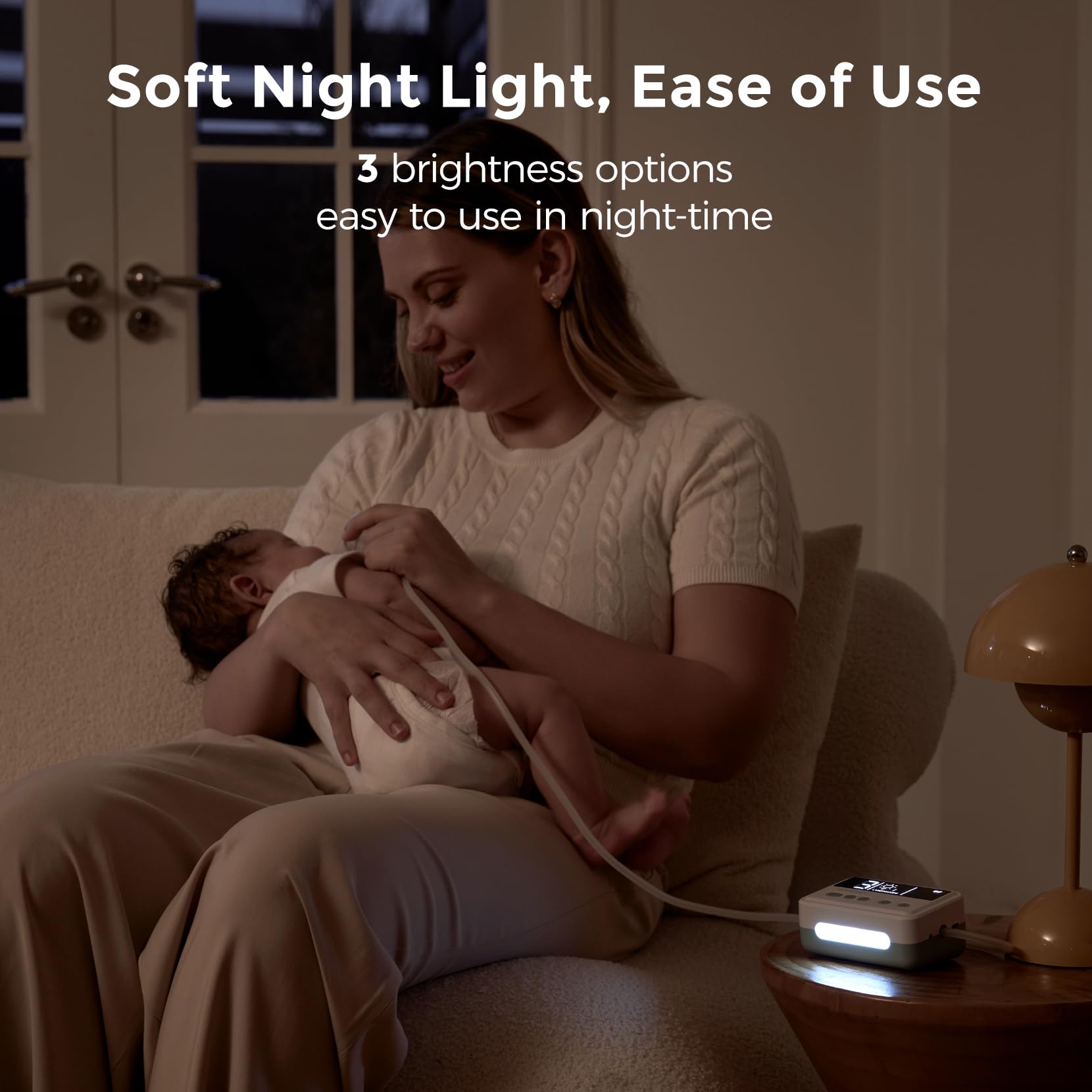 Momcozy in use with parent gently clearing infant nose for easier breathing